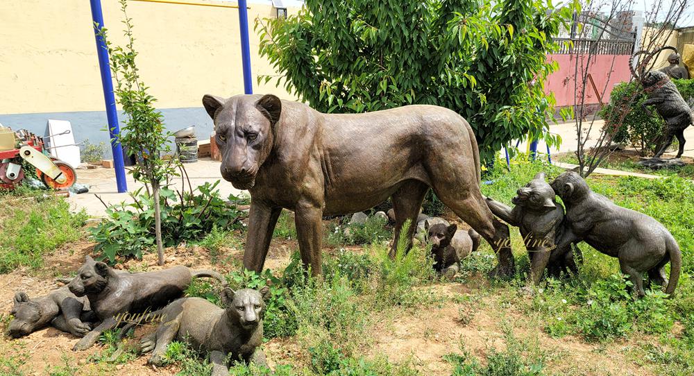 lion statues outside house in USA Majestic Sculpture of a Lioness and a Group of Cubs