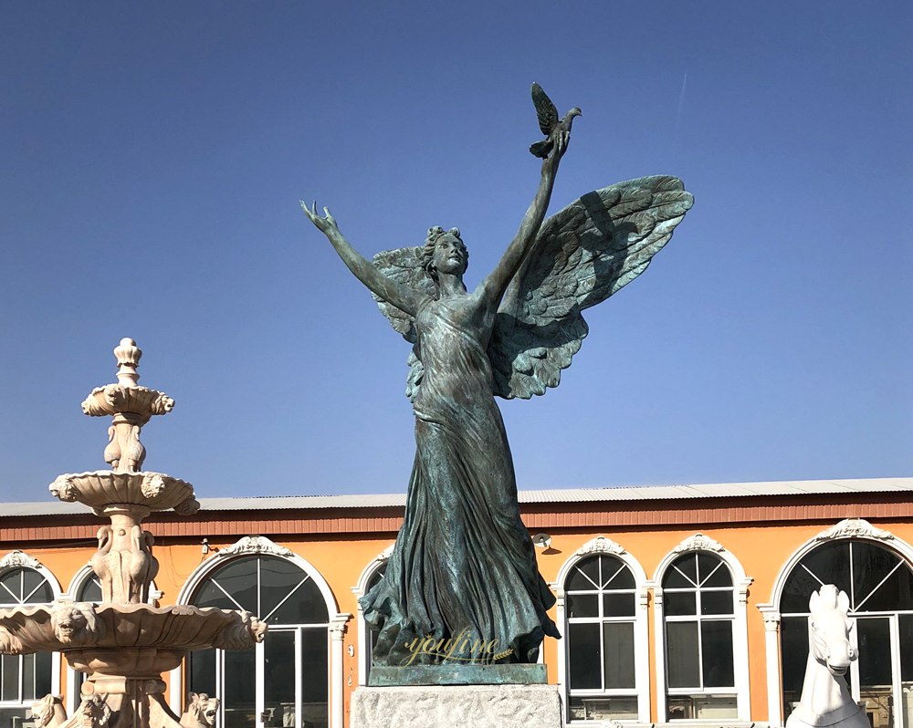 Do Bronze Statues Turn Green? - Blog - 11 YouFine bronze Angel with dove sculpture with green patina