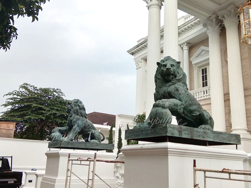 Pair of bronze lion sculptures for a luxury hotel entrance in the United States