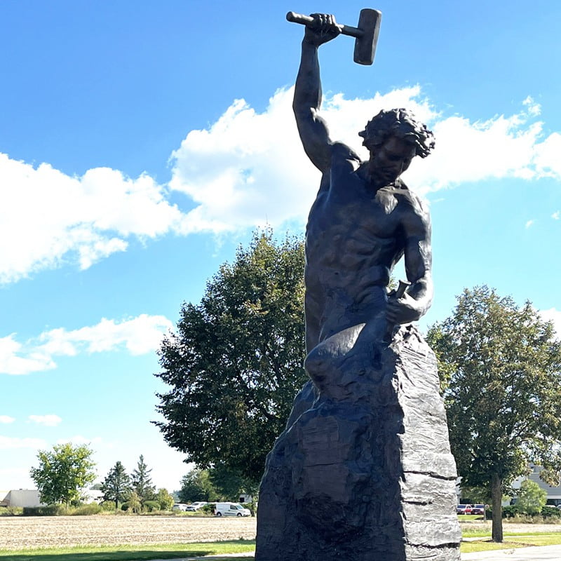 Man Building Himself -- bespoke design with personalized base and plaque