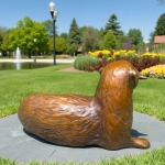 wildlife cute and lively bronze sea otter statue with Sole