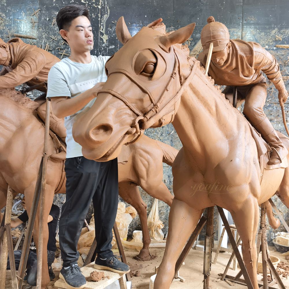 Multiple clay models in progress - racing horses and mare with foal sculptures for U.S. community project
