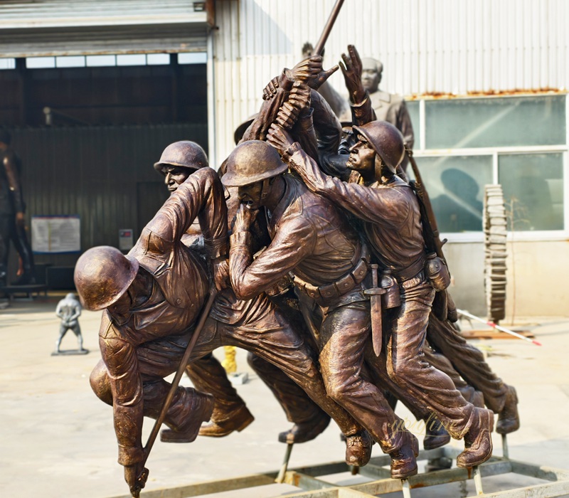 Close-up of historically accurate military uniform details on bronze sculpture