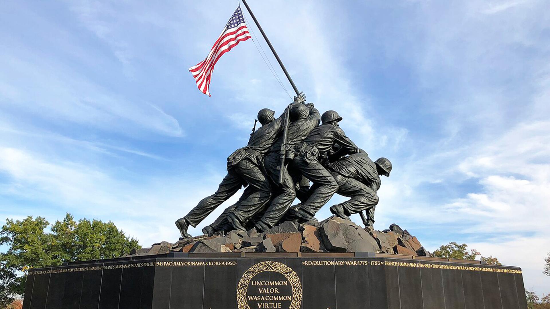 Life-size bronze veteran memorial statue in memorial park