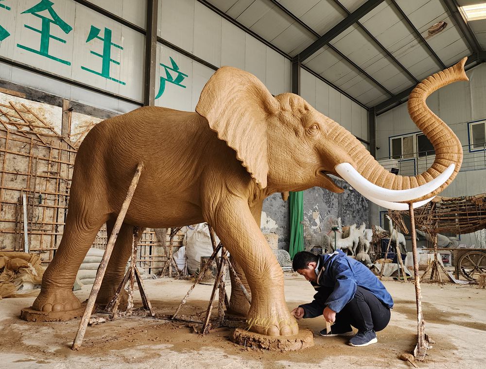 large elephant water fountain clay model