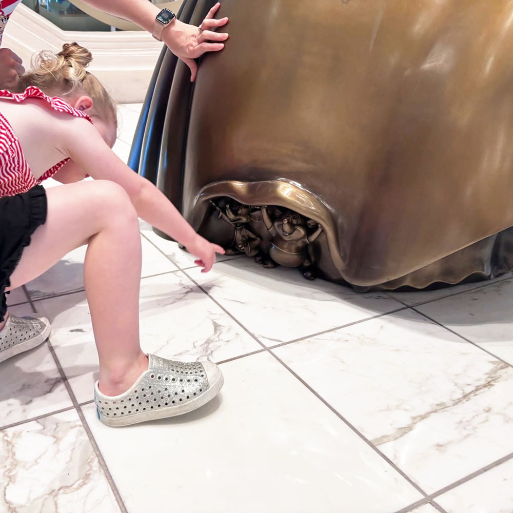 Kids Discover Hidden Mouse Details on Large Bronze Cinderella Statue