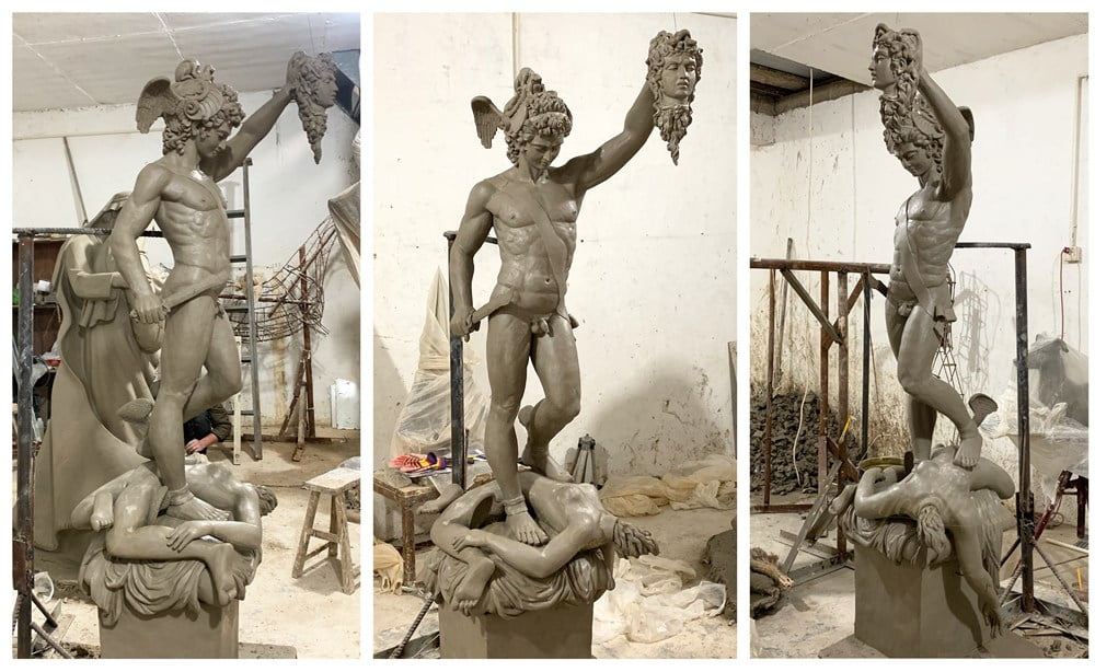 Artisan creating detailed clay model of bronze sculpture