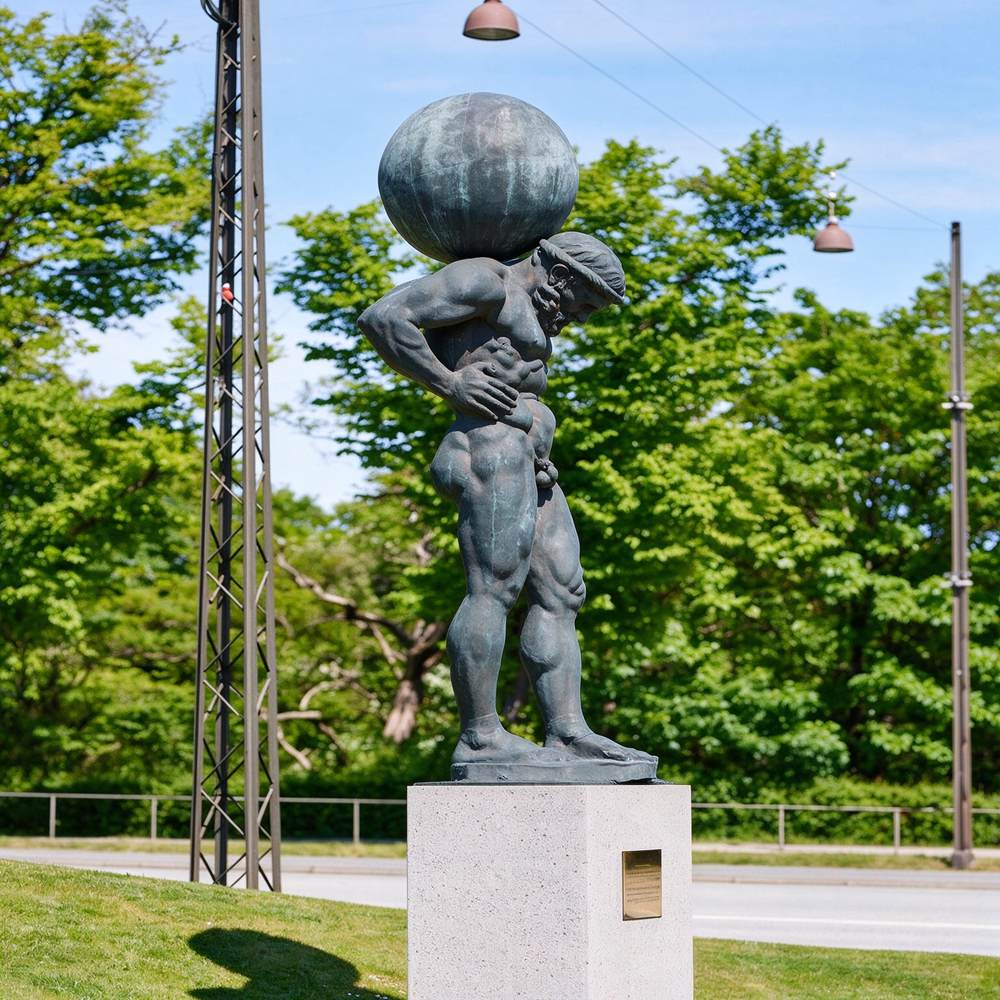 Collage‑Multiple Views Of Famous Atlas Greek Titan Statue Copenhagen