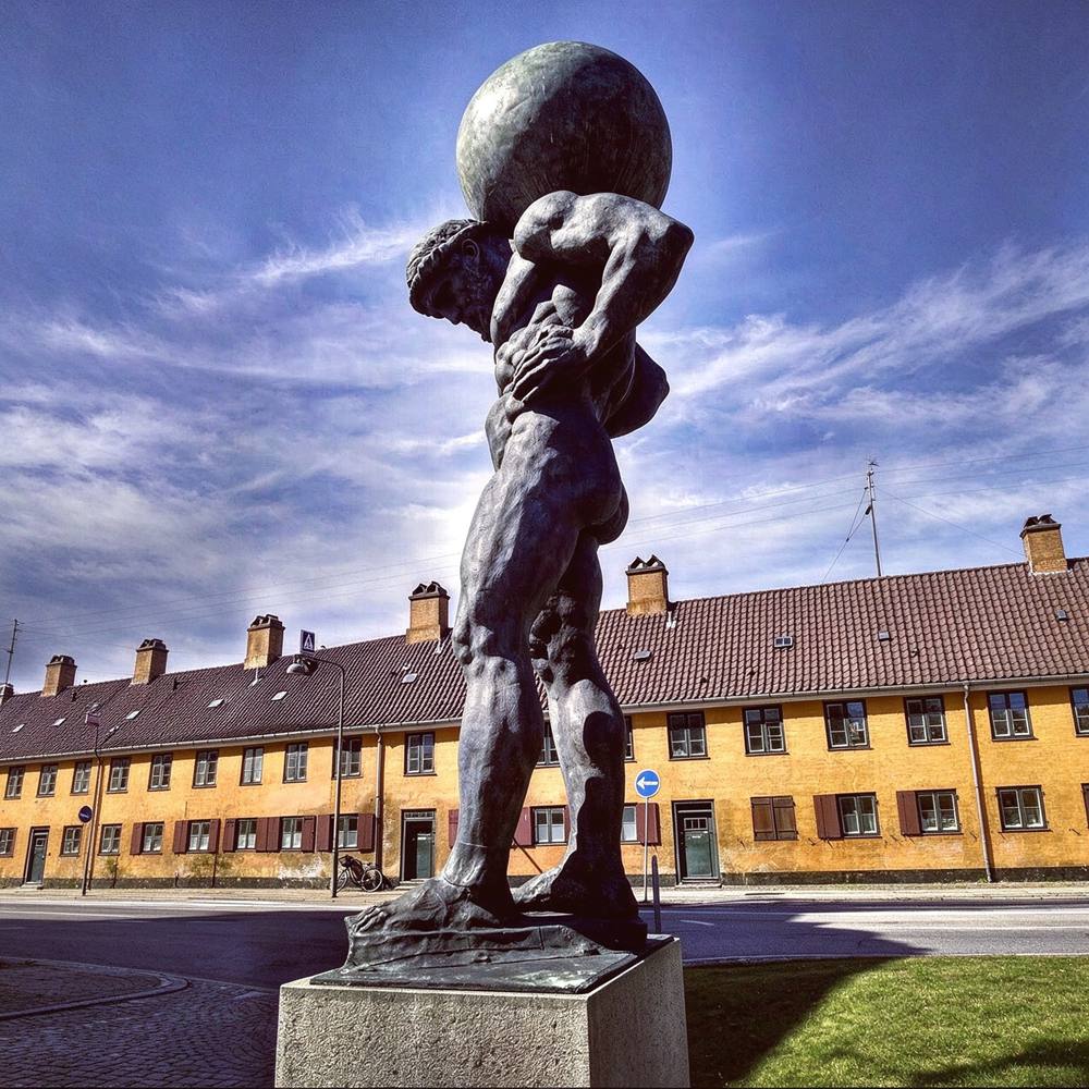 Side Profile View of Giant Bronze Atlas Titan Statue Copenhagen