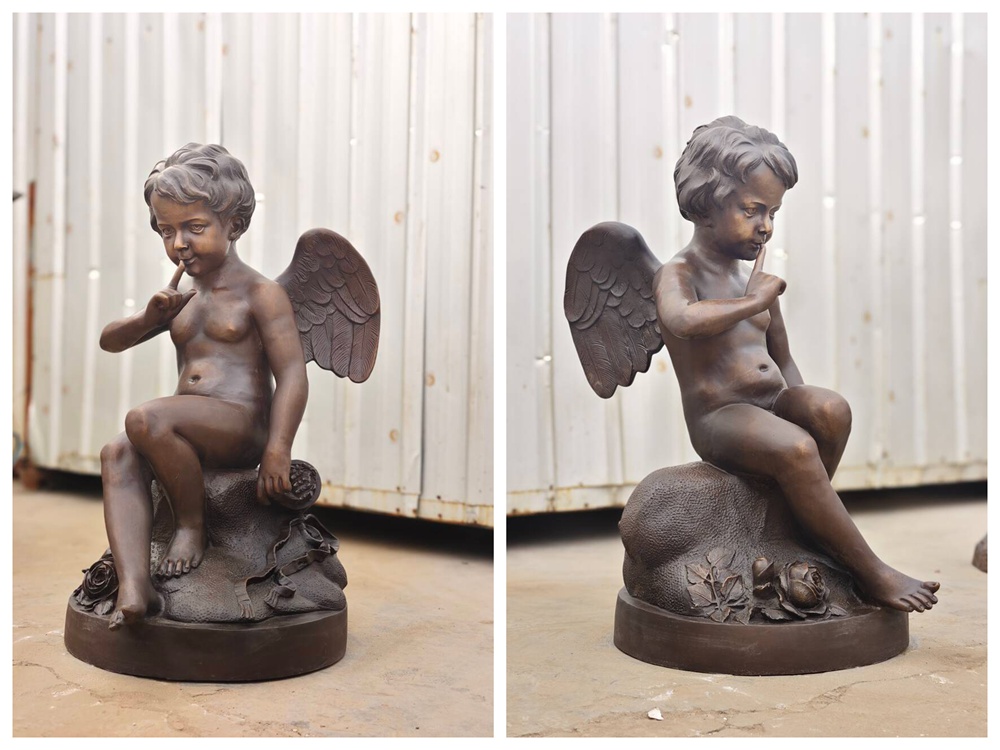 Front and back views of a seated bronze cherub statue in the foundry