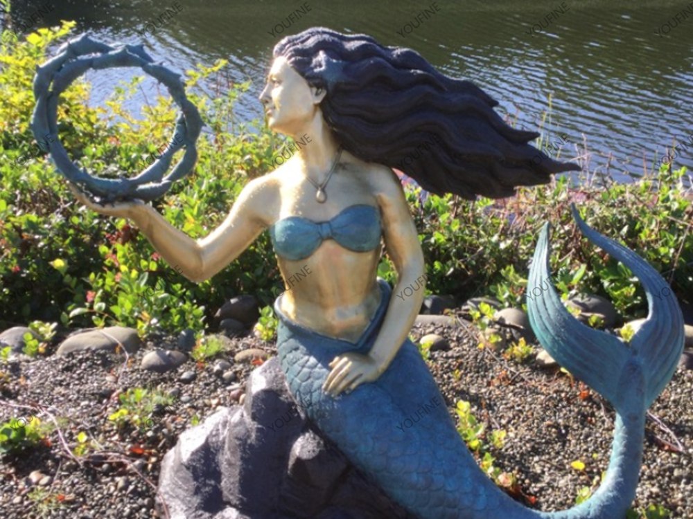 Customer feedback showing a custom bronze mermaid sculpture commissioned by an American fairy-tale storyteller